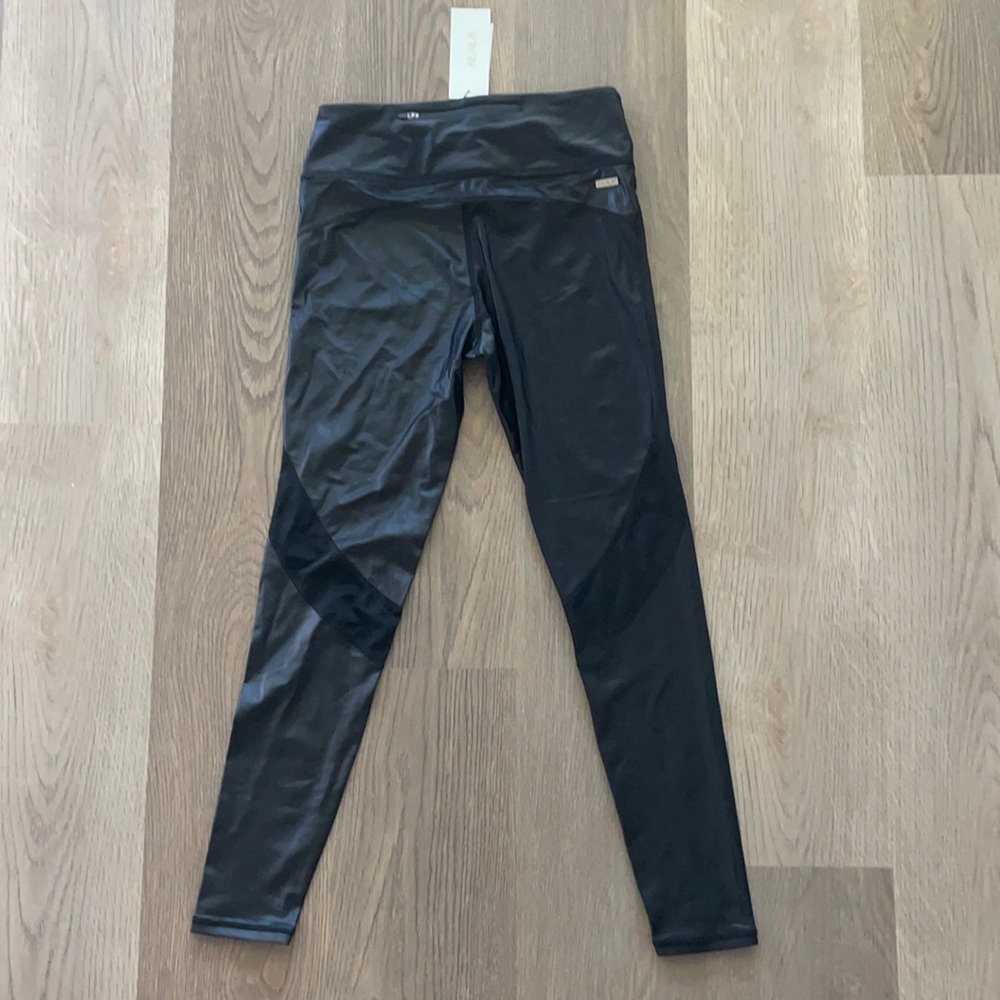 Brand NEW Alala leggings in Liquid Black
